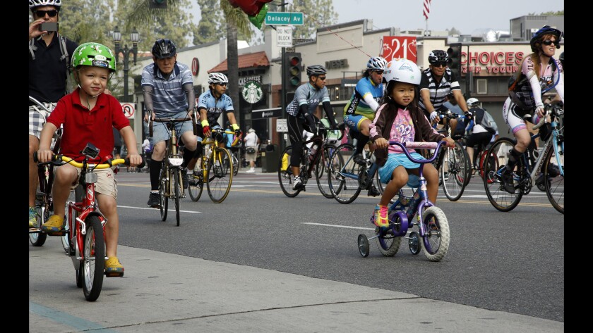 Bicyclists ride down Colorado Boulevard in Pasadena during CicLAvia.