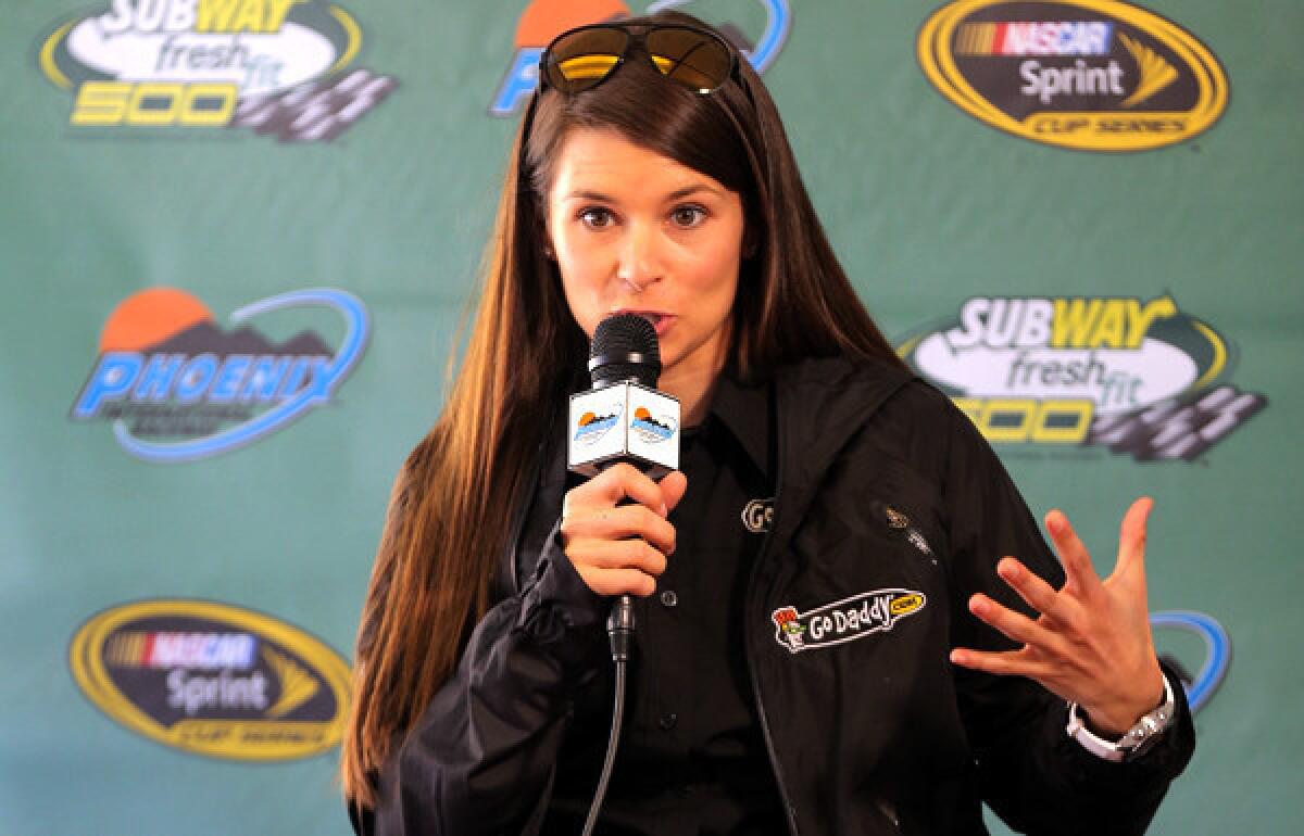 NASCAR driver Danica Patrick addresses the media before practice for the Sprint Cup Series Subway Fresh Fit 500 at Phoenix International Raceway on Friday.