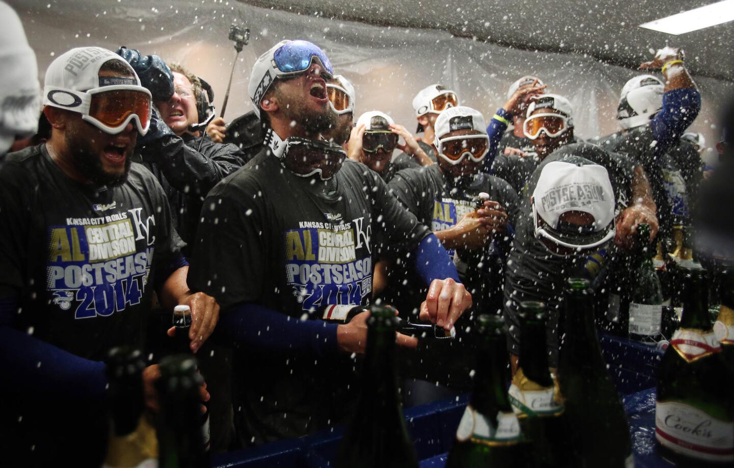 Royals players celebrate with champagne.