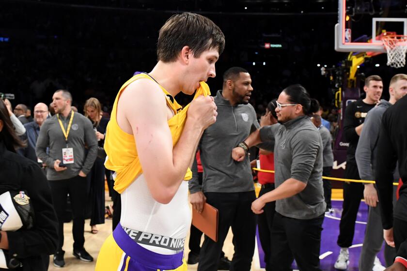 Los Angeles, California May 23, 2023-Lakers Austin Reaves walks off the court after being swept by the Denver Nuggets.