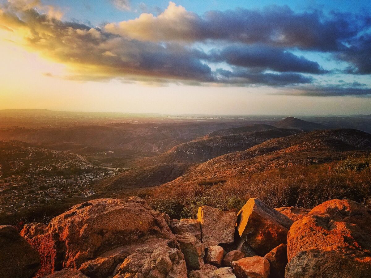 Golden light bathes the top of Cowles Mountain looking out toward the Pacific Ocean.
