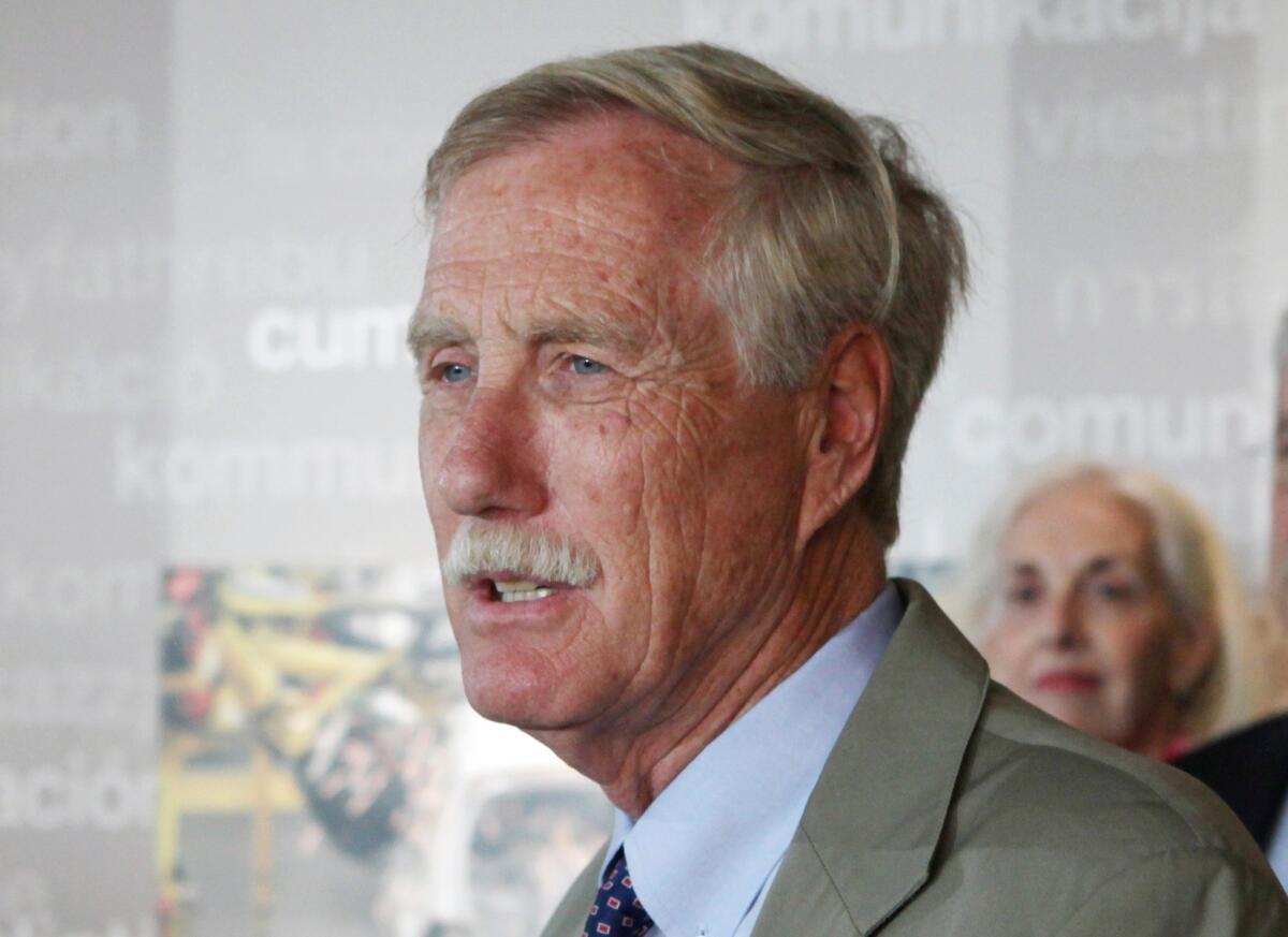 Independent Sen. Angus King of Maine said Wednesday that it was in his state's interests for him to continue to caucus with Senate Democrats. Above, King speaking in Portland, Maine, in August.