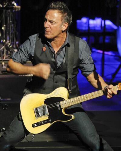 Bruce Springsteen performs with the E Street Band.