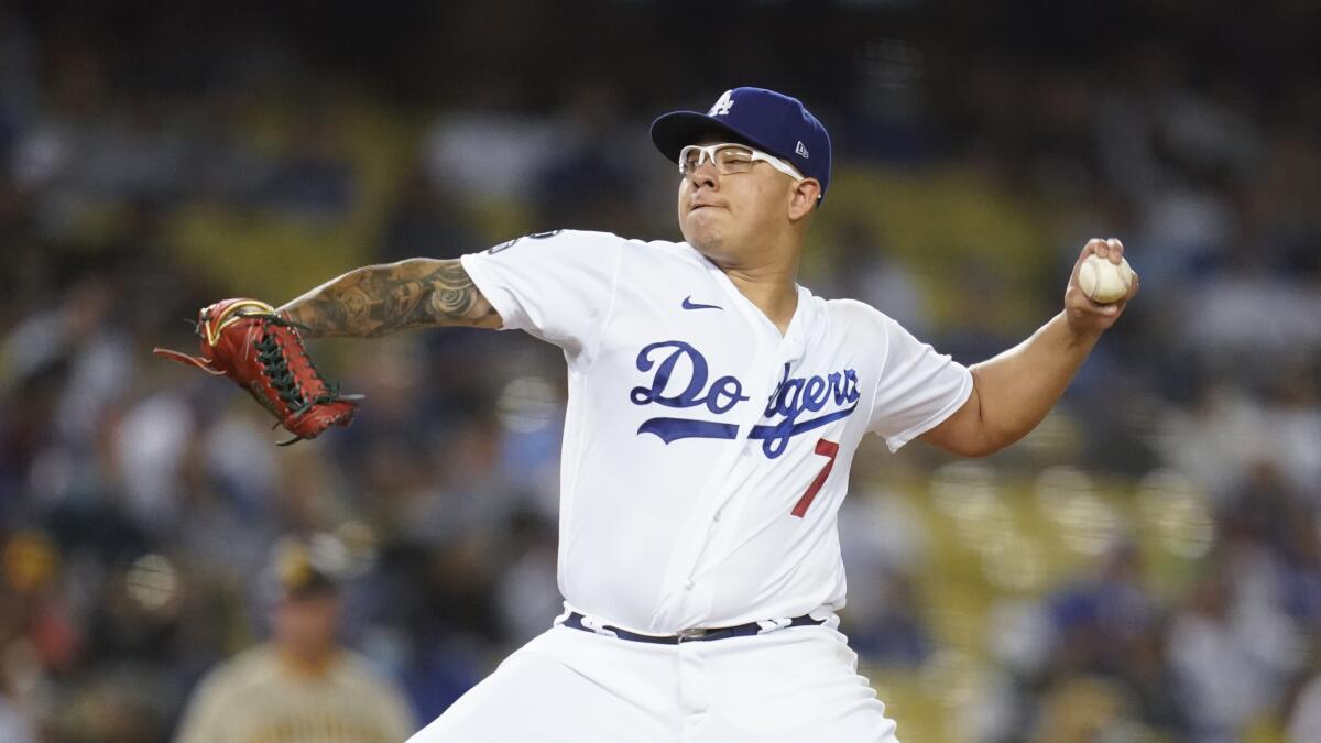 Los Angeles Dodgers starting pitcher Julio Urias (7) throws during a baseball game.