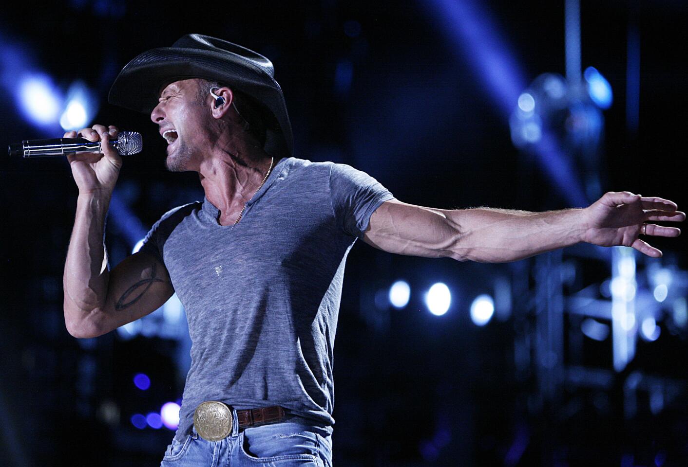 Tim McGraw swats a fan during his Atlanta concert