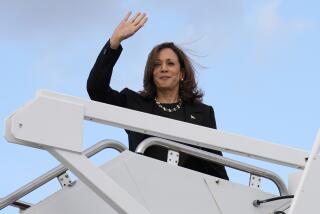 Democratic presidential nominee Vice President Kamala Harris waves as she boards Air Force Two at Joint Base Andrews, Md., Monday, Oct. 14, 2024, en route to Pennsylvania. (AP Photo/Jacquelyn Martin)