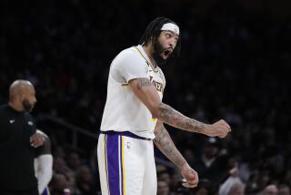 Los Angeles Lakers' Anthony Davis reacts to a foul call on him during the second half.