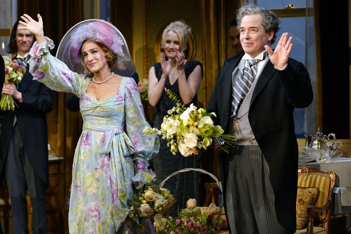 Sarah Jessica Parker and Matthew Broderick appear at the curtain call following the opening night performance of Neil Simon's "Plaza Suite" on Broadway at the Hudson Theatre on Monday, March 28, 2022, in New York. (Photo by Charles Sykes/Invision/AP)