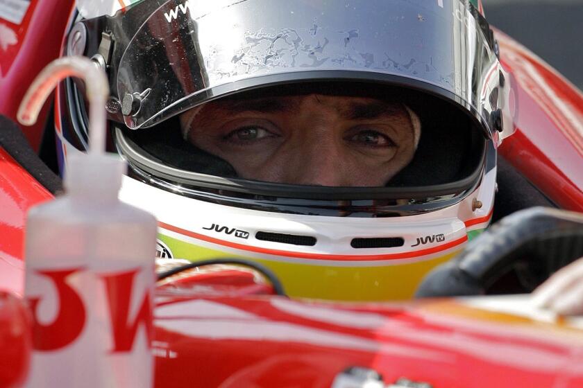 (FILES)-- A file photo taken on November 9, 2007 shows British driver Justin Wilson of the CDW-RusPort Racing team in the pit during the first qualifying session for Champ Car World Series GP in Mexico City.