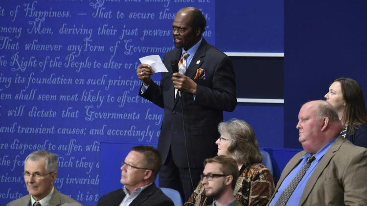 James Carter asks a question during the debate.