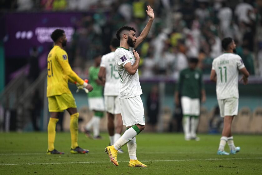 Saudi Arabia's Abdulrahman Al-Aboud reacts at the end of the World Cup group C soccer match between Saudi Arabia and Mexico, at the Lusail Stadium in Lusail, Qatar, Thursday, Dec. 1, 2022. (AP Photo/Ebrahim Noroozi)