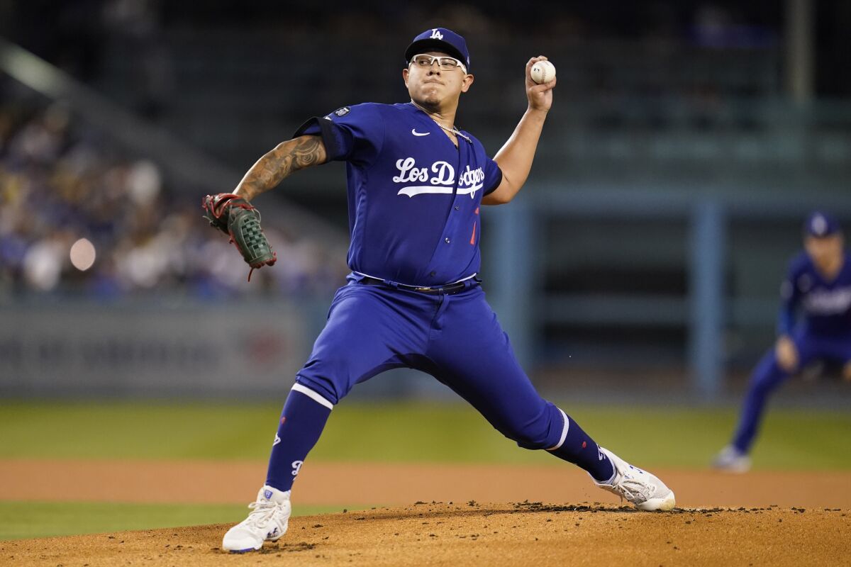 Dodgers starting pitcher Julio Urias pitches during the first inning against the Arizona Diamondbacks.