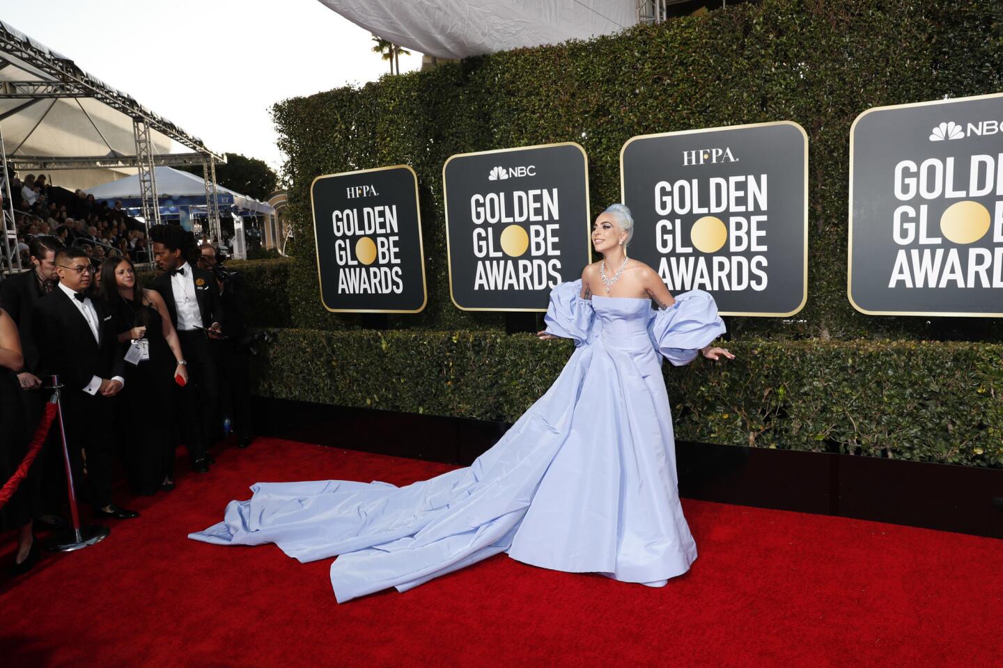 Lady Gaga's custom periwinkle Valentino Haute Couture gown paid homage (wittingly or unwittingly) to one of the standout dresses worn by Judy Garland in the 1954 version of "A Star Is Born."