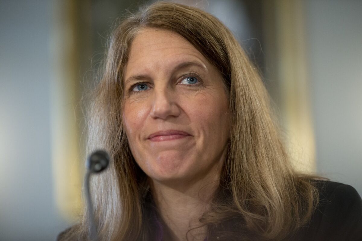Health and Human Services Secretary Sylvia Mathews Burwell on Thursday lowered projections of the number of people who will sign up for health coverage next year.