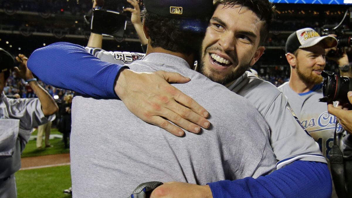 Kansas City Royals' Eric Hosmer, right, celebrates after Game 5 of the Major League Baseball World Series against the New York Mets, Nov. 2, 2015, in New York.