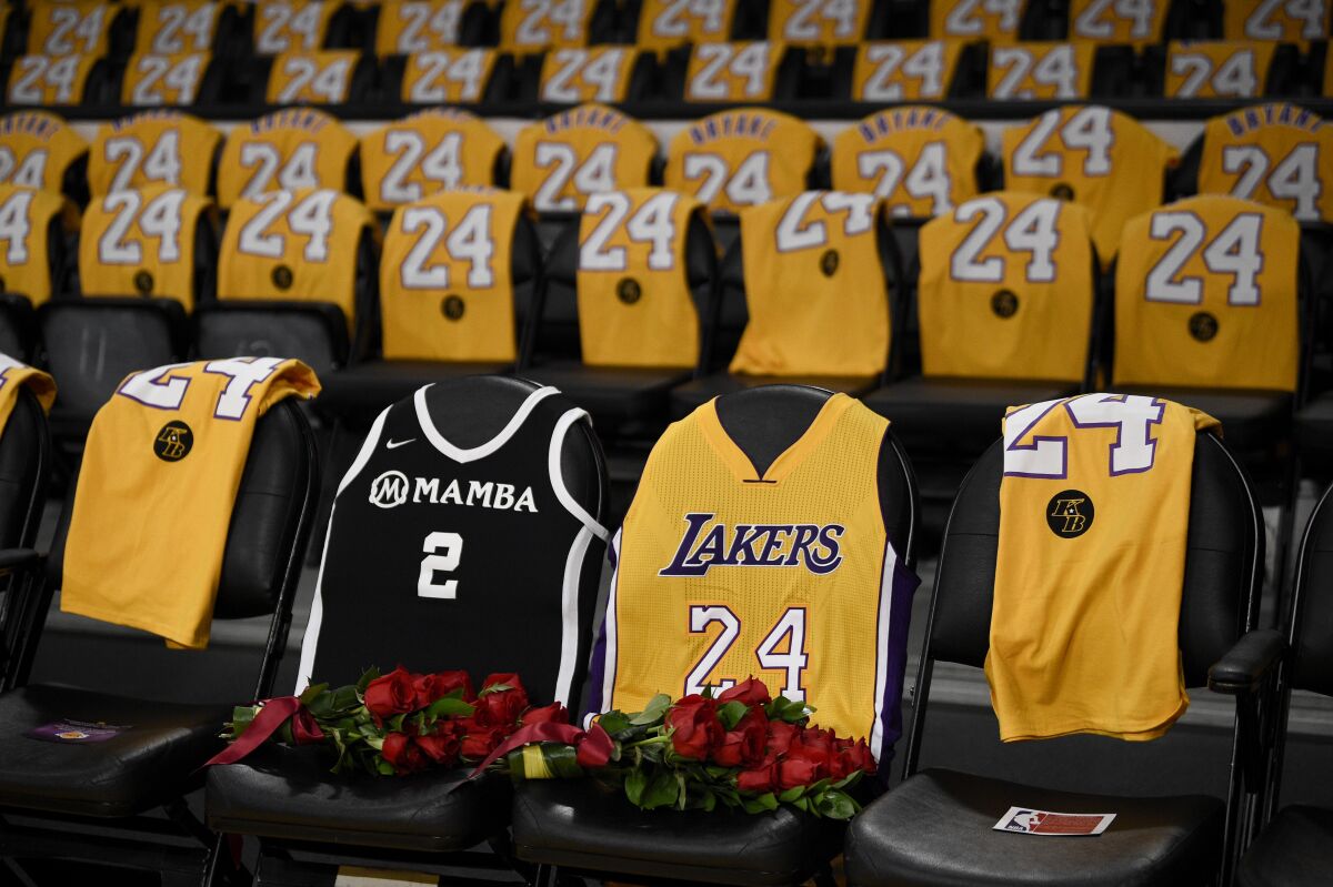 The jerseys of Kobe Bryant, right, and his daughter Gianna are draped on the seats that the two last sat in at Staples Center, prior to the Lakers' Jan. 31 game at Staples Center. 