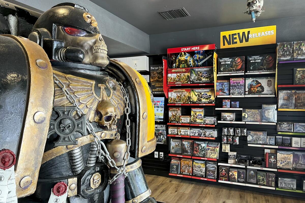Warhammer models and games in a store 
