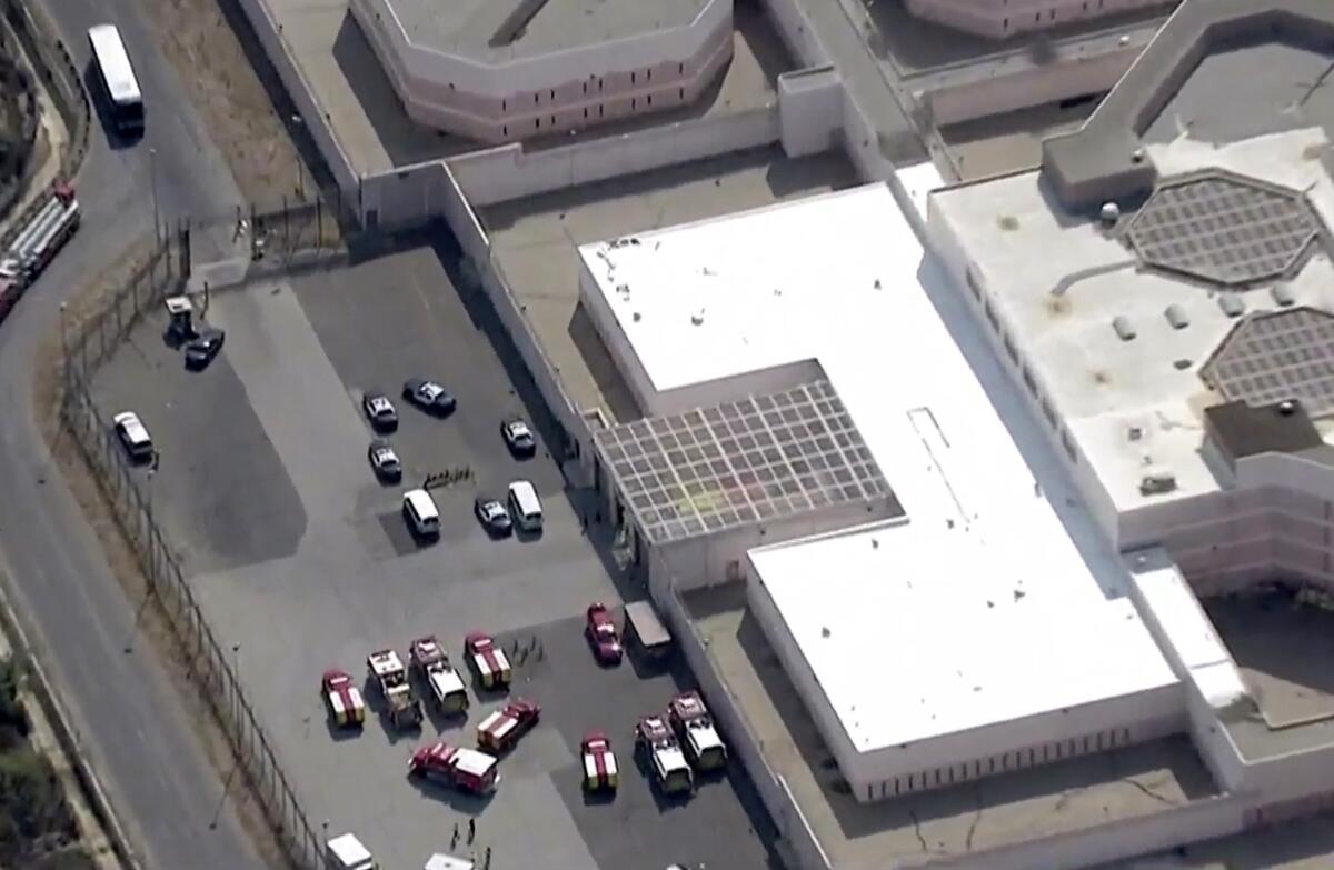 Aerial view of the Pitchess Detention Center shows emergency vehicles outside