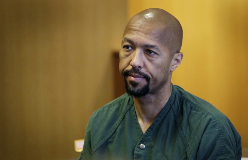 FILE - In this Aug. 5, 2016 file photo, ex-Detroit City Council president and former TV news anchor Charles Pugh returns to a courtroom during his preliminary trial at the Frank Murphy Hall of Justice in Detroit. Pugh has been granted parole about five years after his conviction for having sex with a teenage boy when he previously worked as a TV journalist. Michigan's Department of Corrections says Pugh is expected to be released from prison sometime in December 2021. (Mandi Wright/Detroit Free Press via AP, File)