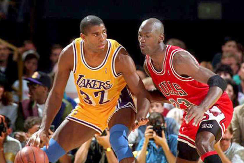 Magic Johnson squared off against Michael Jordan in the 1991 NBA Finals, five months before Johnson's announcement that he had HIV. The Bulls would defeat the Lakers in five games to claim the championship series.
