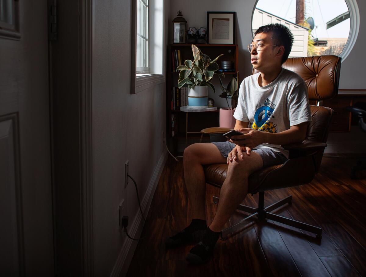 Entrepreneur Eden Chen in his L.A. home office. He uses WeChat to communicate with businesses in China. 