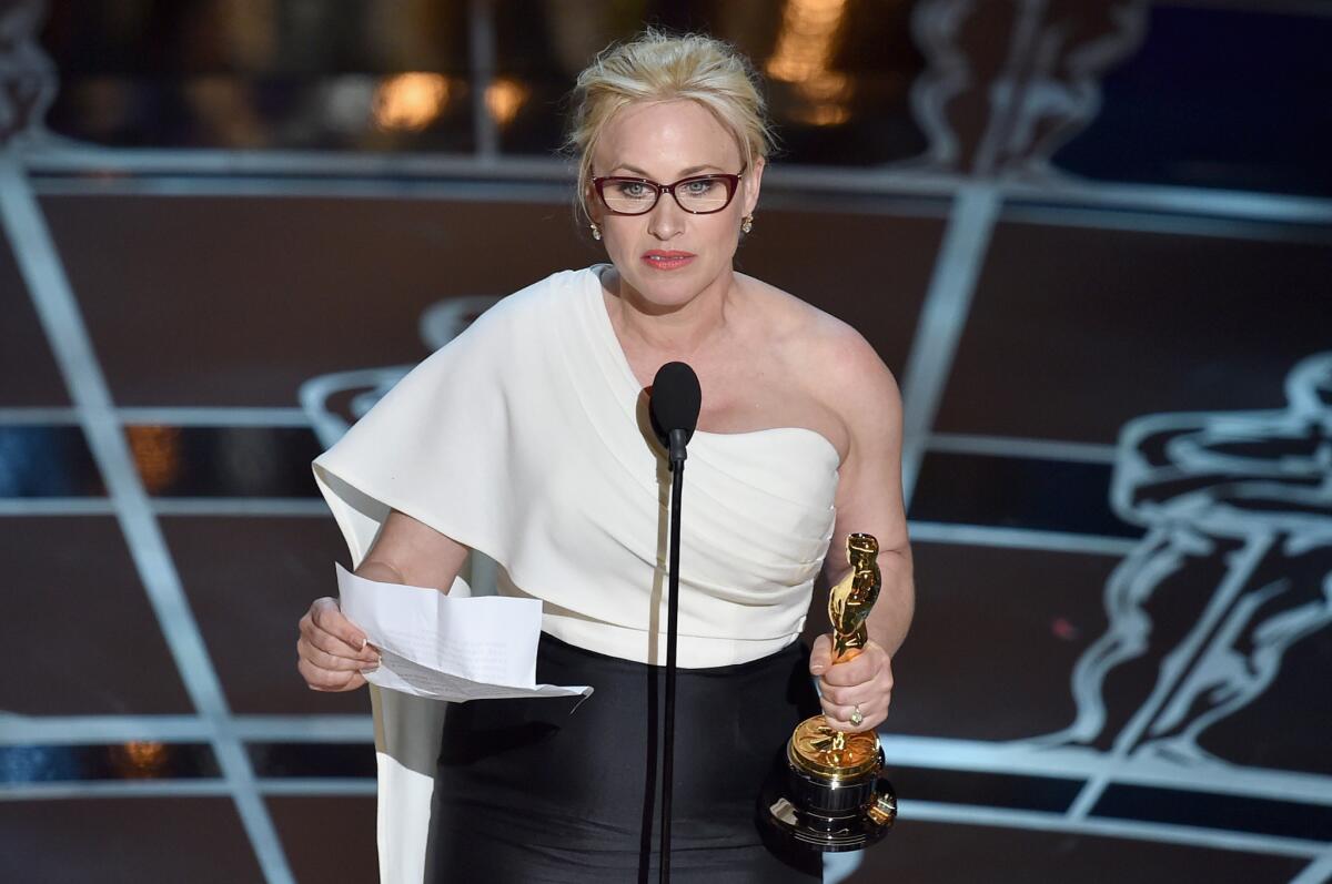 Patricia Arquette accepts the Oscar for supporting actress for "Boyhood."