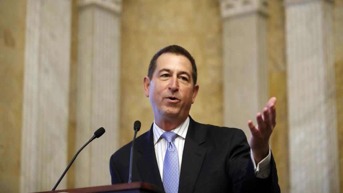 Joseph M. Otting speaks after his swearing in ceremony as comptroller of the currency, at the Treasury Department on Nov. 27, 2017, in Washington.