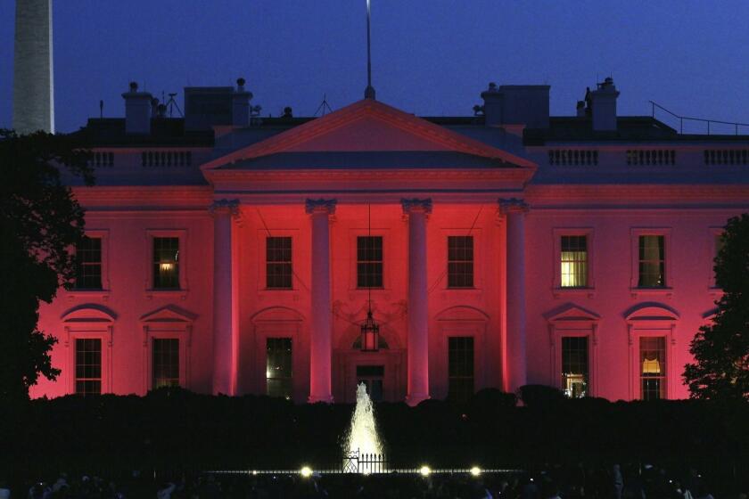 WASHINGTON - OCTOBER 14: The White House is bathed in pink light for National Breast Cancer Awareness Month October 14, 2010 in Washington, DC. October is observed as Breast Cancer Awareness Month every year, by public service groups, medical professionals and government agencies that combine to promote awareness of the disease. (Photo by Win McNamee/Getty Images) ** TCN OUT ** ORG XMIT: 104424617