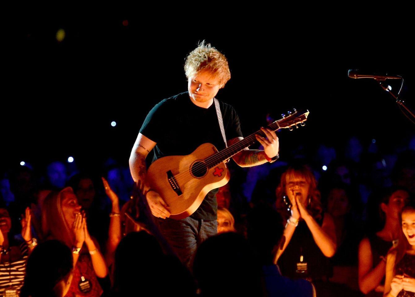 Ed Sheeran performs onstage during the 2013 Billboard Music Awards.