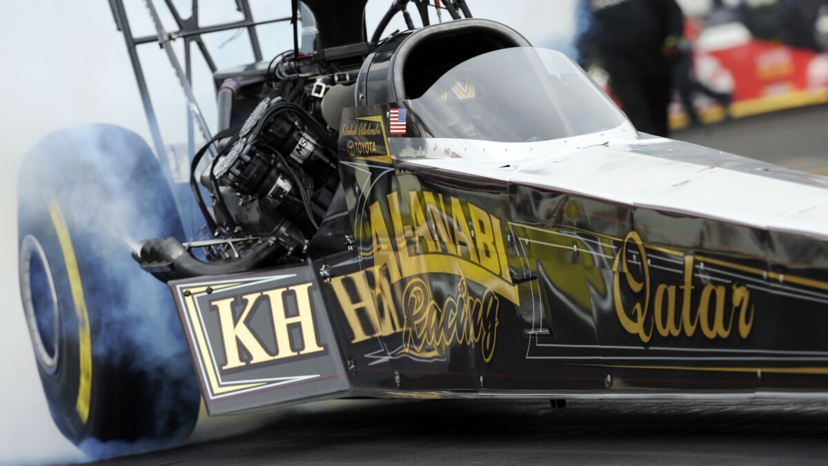 Top Fuel driver Khalid alBalooshi drives to victory during the NHRA Winternationals at Auto Club Raceway in Pomona last year.