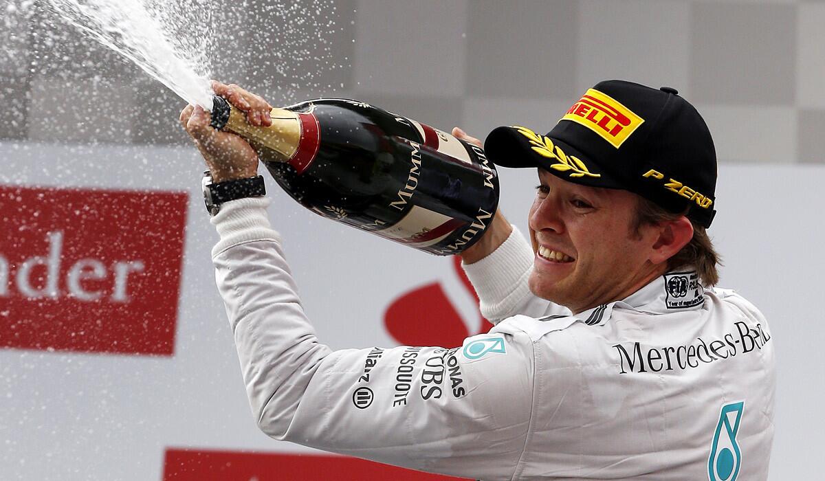 Formula One driver Nico Rosberg celebrates after winning the German Grand Prix on Sunday.