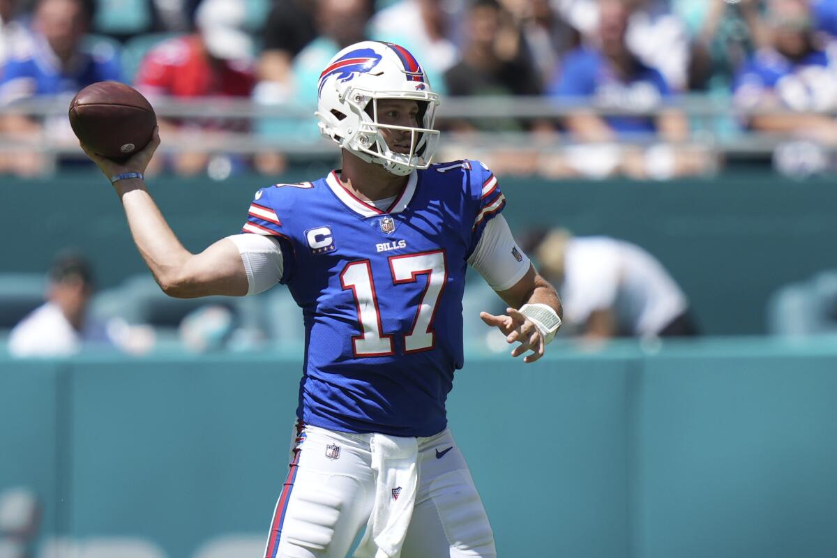 Buffalo Bills quarterback Josh Allen makes a pass attempt against the Miami Dolphins.