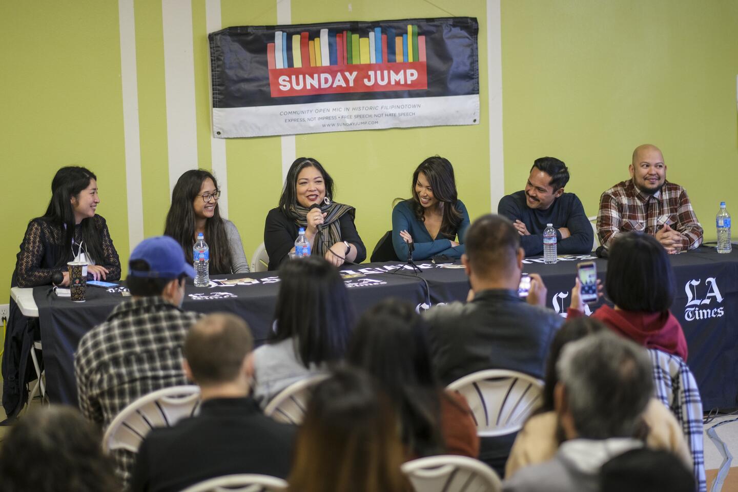 Moderator Ada Tseng of The Times, left, with panelists Agnes Constante, Christine Catipon, Tess Paras, Joel Relampagos and Anthony Ocampo in conversation in L.A.'s Historic Filipinotown on Sunday.