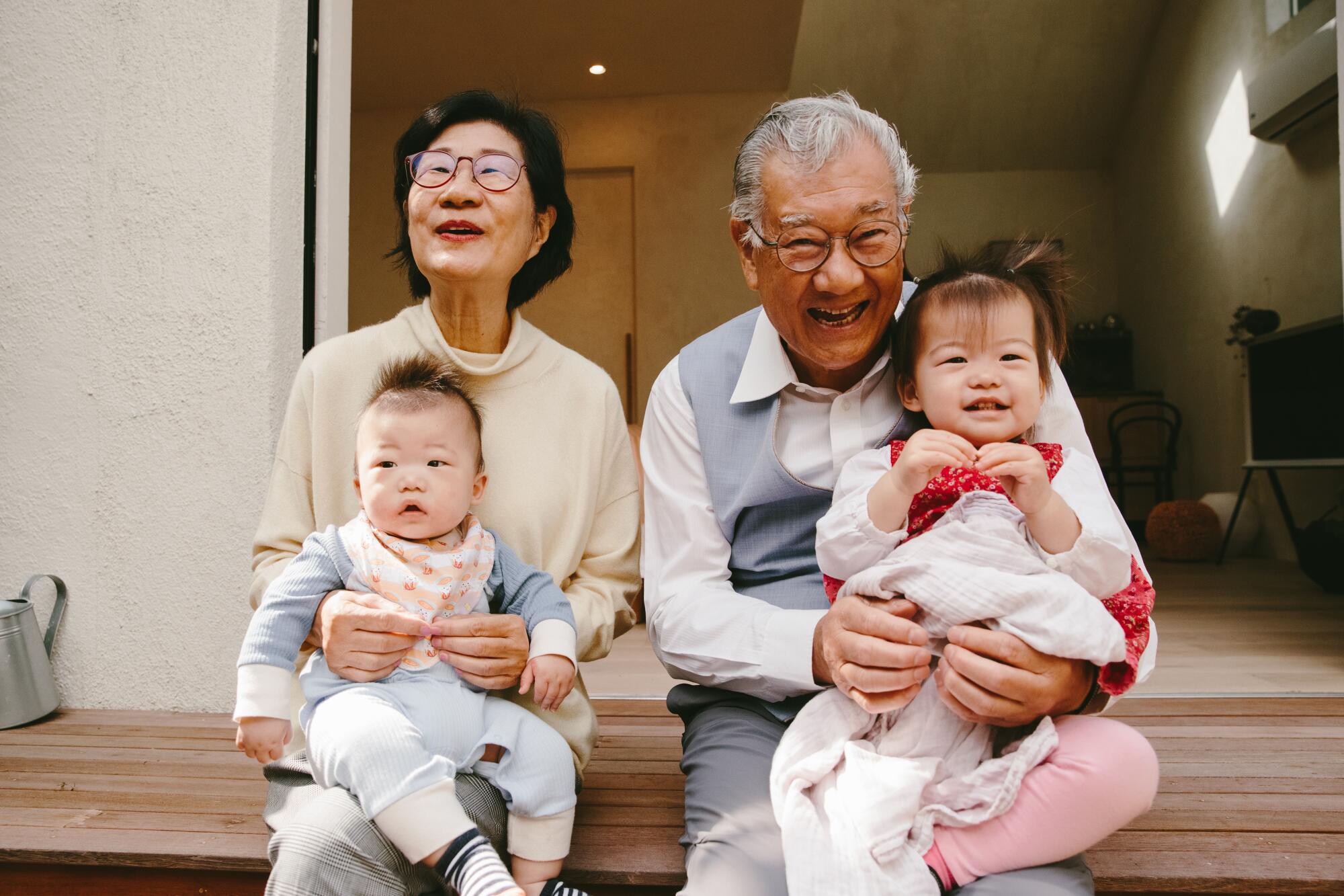 Grandparents are Wendy Lam and Alec Chan; children are Esme Chan and Dash Chan;