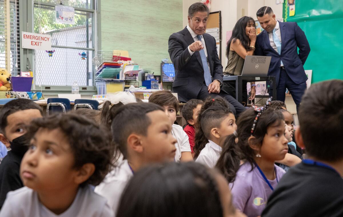 L.A. Unified Supt. Alberto Carvalho gestures during a visit with first graders at Coldwater Canyon Elementary in Valley Glen 