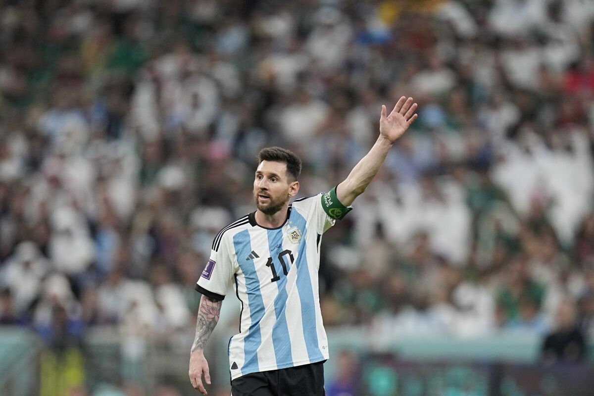 Argentina's Lionel Messi gestures during the World Cup group C soccer match between Argentina and Mexico