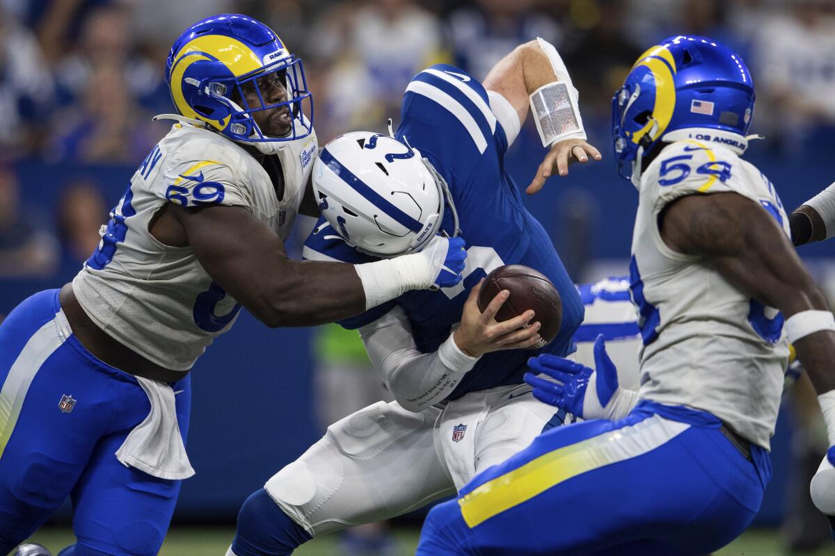 Rams defensive lineman Sebastian Joseph-Day (69) sacks Indianapolis Colts quarterback Carson Wentz.