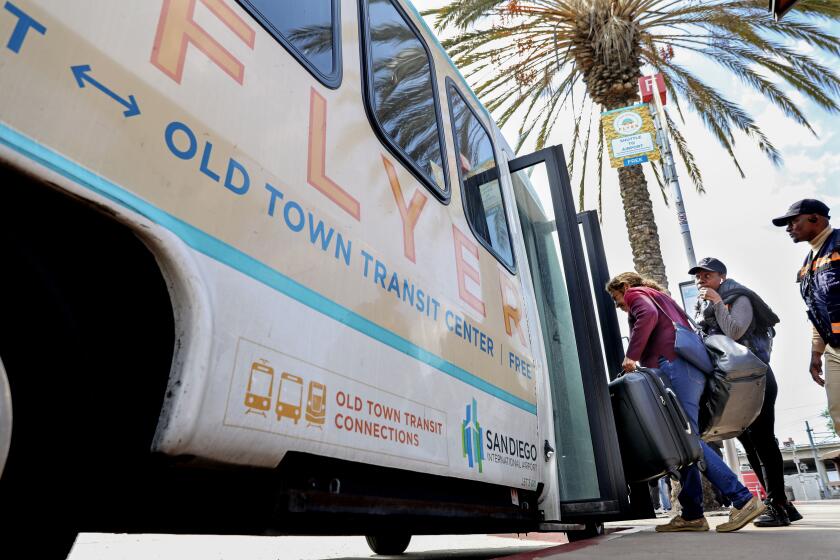 Passenger board the free airport shuttle bus at the Old Town Transit Center on Wednesday, April24, 2024 in San Diego.. (Photo by Sandy Huffaker for The SD Union-Tribune)