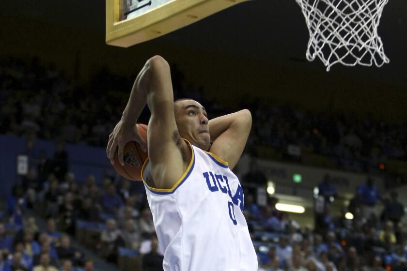 UCLA's Drew Gordon goes up for a dunk during a basketball game against USC