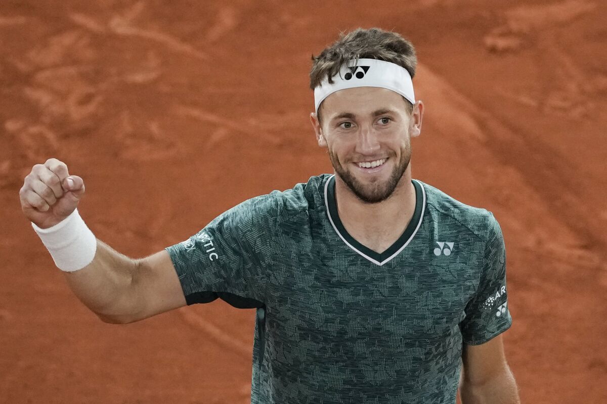 Casper Ruud celebrates after defeating Marin Cilic 3-6, 6-4, 6-2, 6-2 in the French Open semifinals.