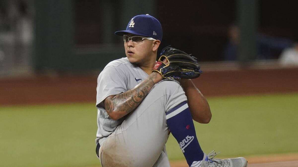 Dodgers starting pitcher Julio Urías throws against the Atlanta Braves in Game 3 of the NLCS in October.