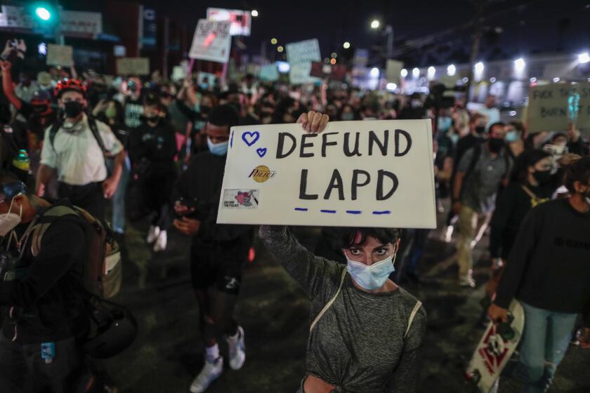 Los Angeles, CA, Thursday, September 24, 2020 - People protest the Kentucky grand jury decision in the case of Breonna Taylor's death by Louisville police. (Robert Gauthier/ Los Angeles Times)