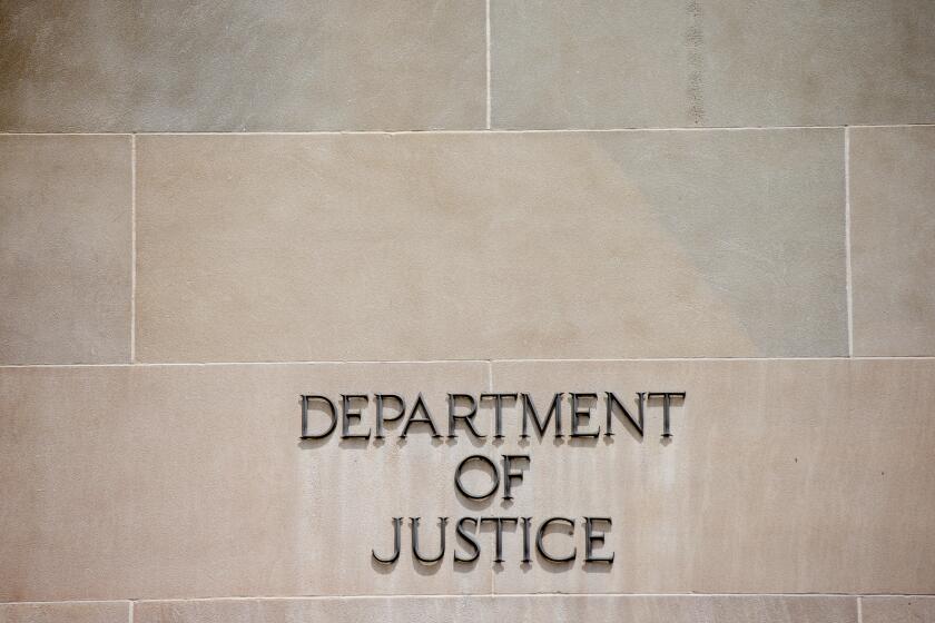 Robert F. Kennedy Department of Justice Building, Friday, June 19, 2015, in Washington. (AP Photo/Andrew Harnik)