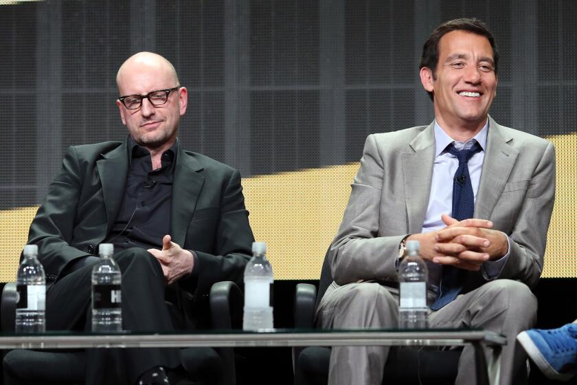 Director Steven Soderbergh, left, and actor Clive Owen tout their upcoming Cinemax drama "The Knick" at the Television Critics Assn. press tour Thursday in Beverly Hills.