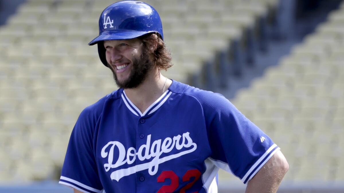 Dodgers ace Clayton Kershaw waits his turn for batting practice Thursday afternoon at Dodger Stadium before Game 5.