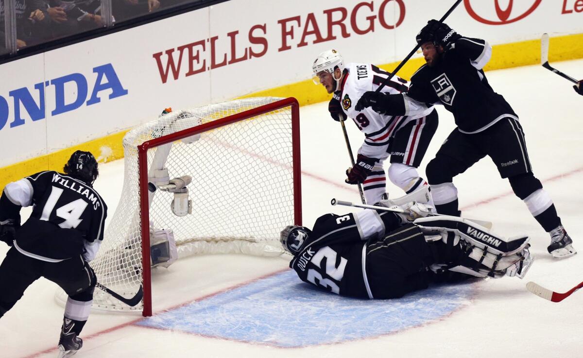 Chicago Blackhawks captain Jonathan Toews, center, scores past Kings goalie Jonathan Quick during Game 3 of the Western Conference finals at Staples Center.