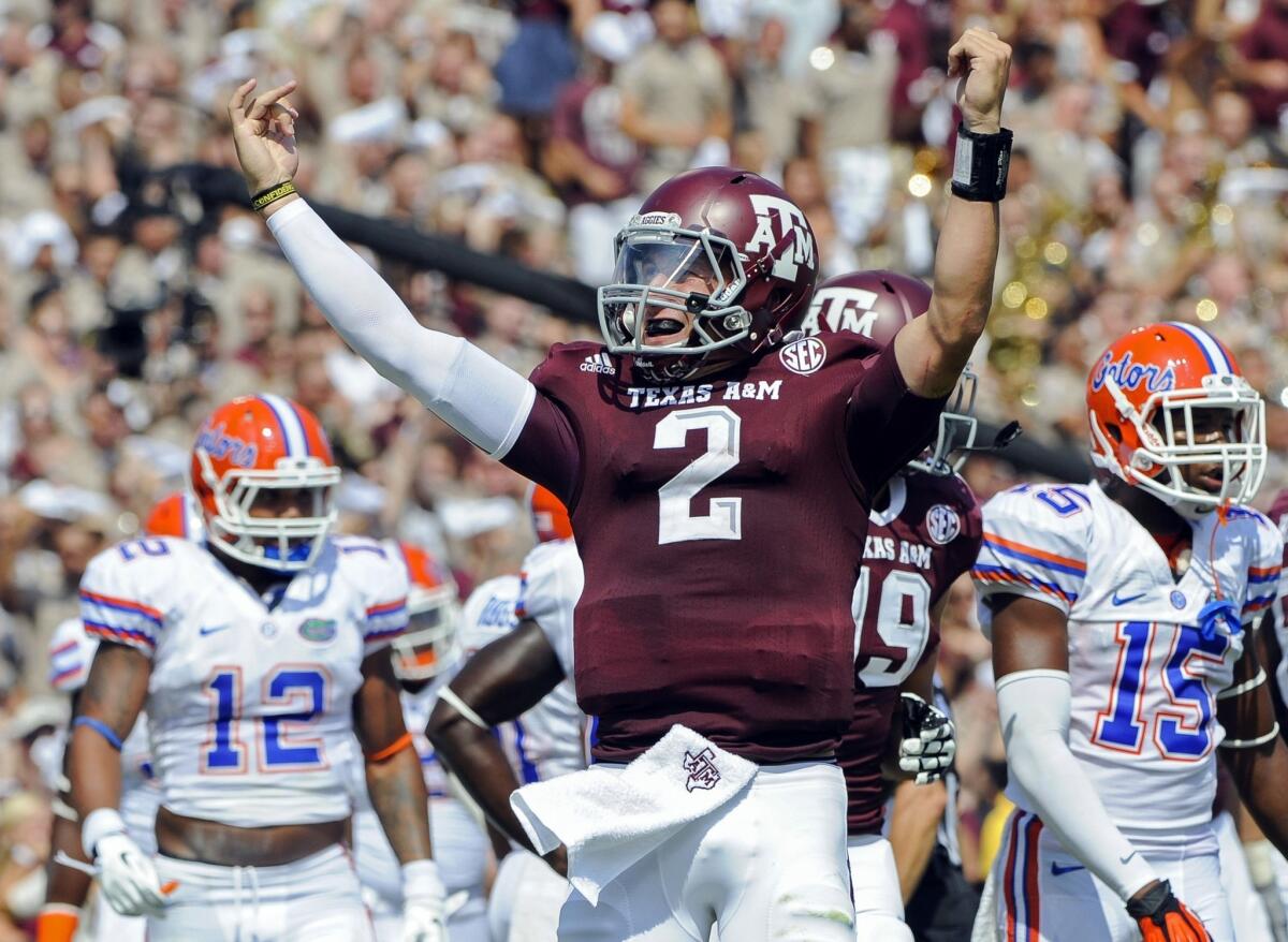 Texas A&M; quarterback Johnny Manziel is reportedly under investigation by the NCAA for signing autographs for money.