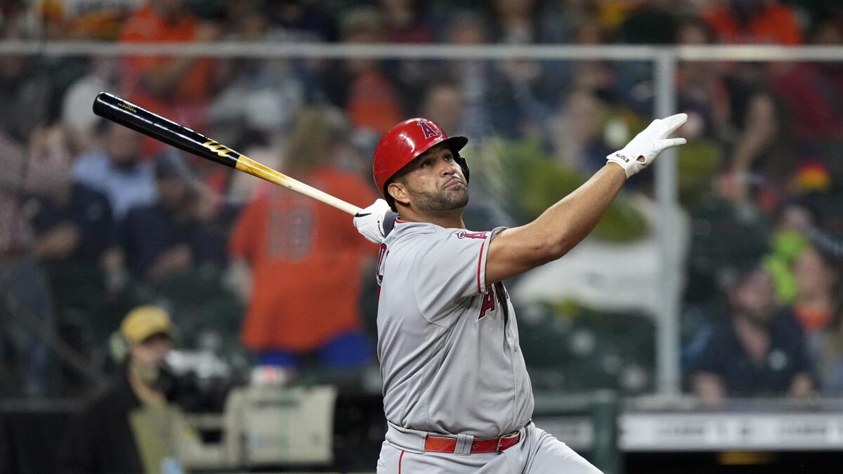 Angels slugger Albert Pujols hits a home run against the Houston Astros on April 22.