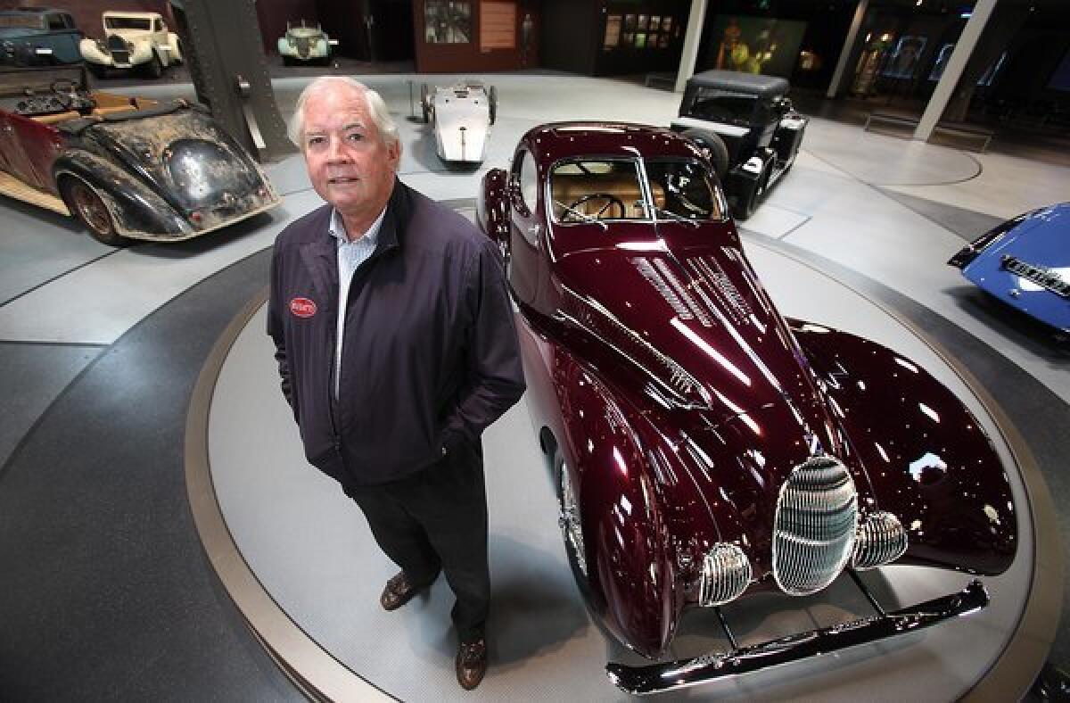 Peter and Merle Mullin are donating $15 million to Art Center College of Design in Pasadena. Above, a file photo shows Peter Mullin next to a 1938 Talbot Lago at his museum in Oxnard.