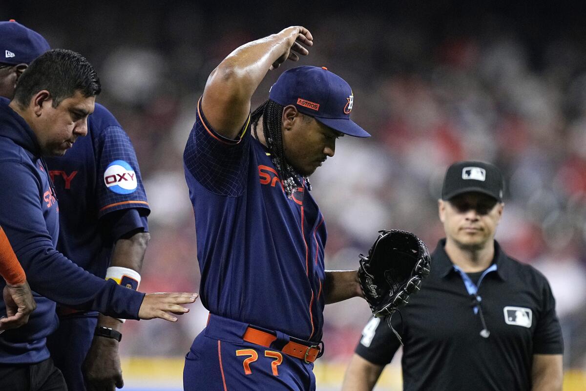 Astros starter García leaves in 1st with elbow discomfort - The